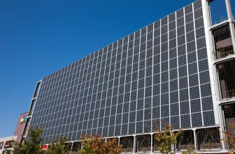 Solar panels installed on the outer wall of commercial buildings.