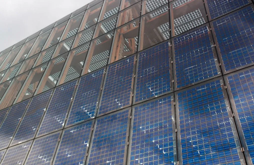  A photovoltaic system integrated into a building facade.
