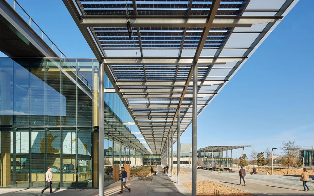 A semi-transparent solar installation on a commercial building facade.