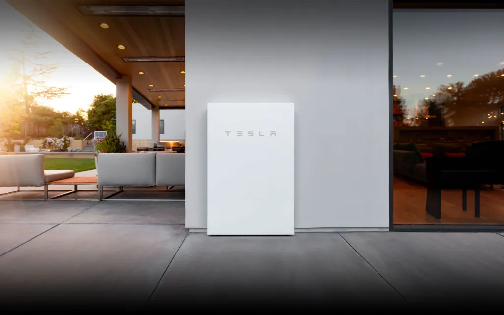 7 Best Powerwall Alternatives 2 Tesla Powerwall mounted on the wall of the house.